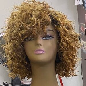 Custom (Wig) unit. Size at 21 /22 circumference. It is stitched. Human hair